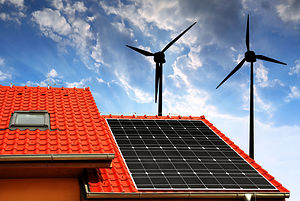 Themenbild: Hausdach mit Solarzellen und Windkraftanlage